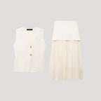 Matchande set dam – väst med plisserad kjol