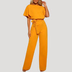 Dam jumpsuit med kort ärm och vida ben