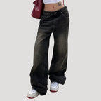 Dam svarta baggy jeans med vida ben och låg midja