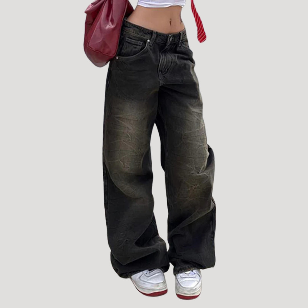Dam svarta baggy jeans med vida ben och låg midja