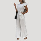 Dam jumpsuit med volangärm och knytband i midjan elegant