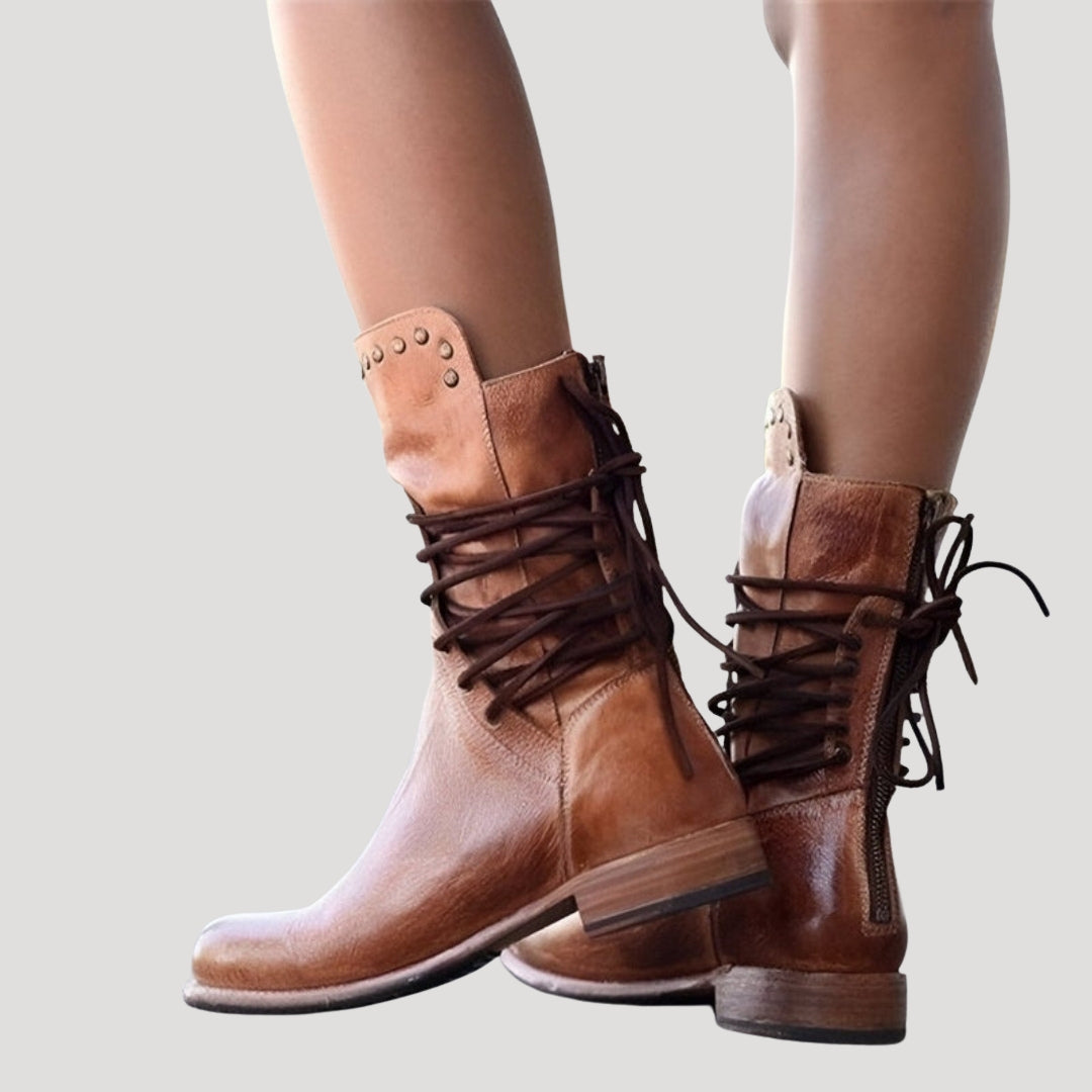 Dam låga ankelboots i skinn med snörning