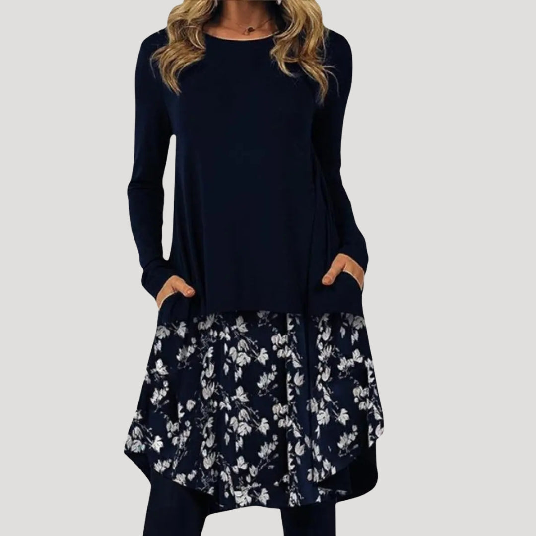 Dam långärmad tunikaklänning med mönstrad nederdel och fickor stilren