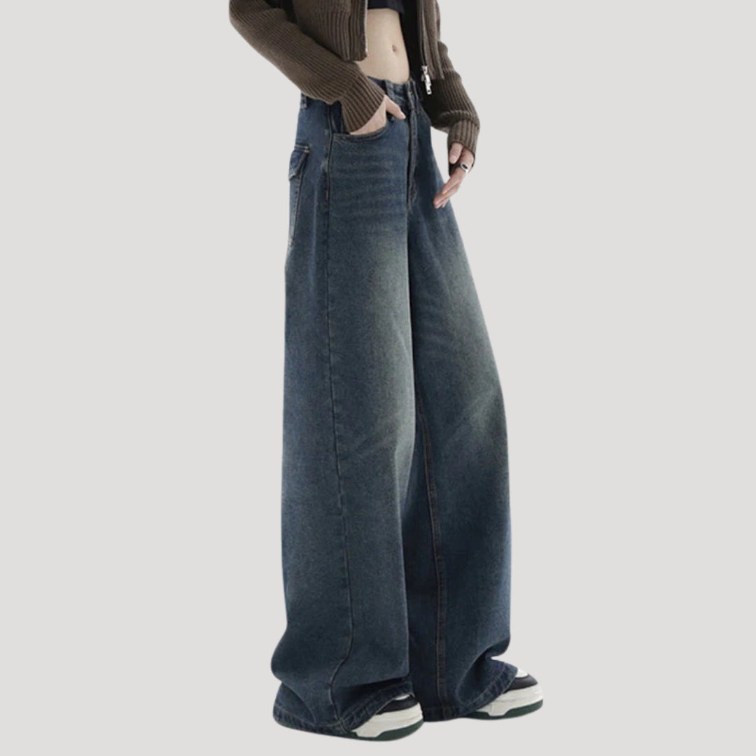 Dam högmidjade vida mörka denimjeans med breda ben och lös passform