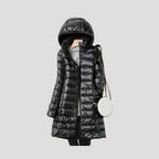 Dam lång vinterjacka med huva och vaddering 5