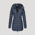 Dam lång vinterrock med huva vadderad och stilren 0