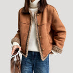 Dam teddy vinterjacka med knäppning för kalla dagar