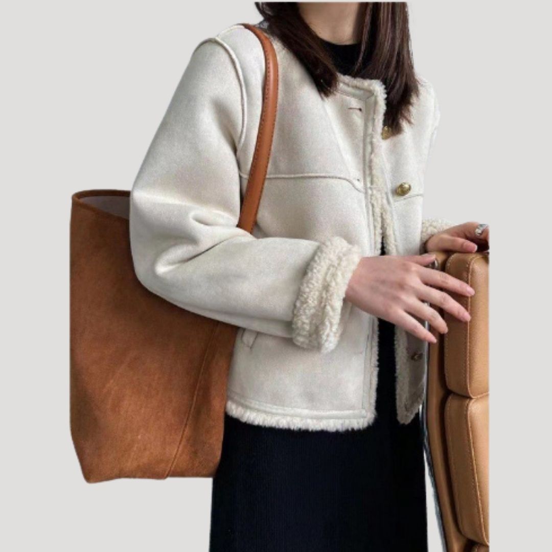 Dam teddy vinterjacka med knäppning för kalla dagar