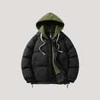 Herr svart pufferjacka quiltad med huva för vinterbruk