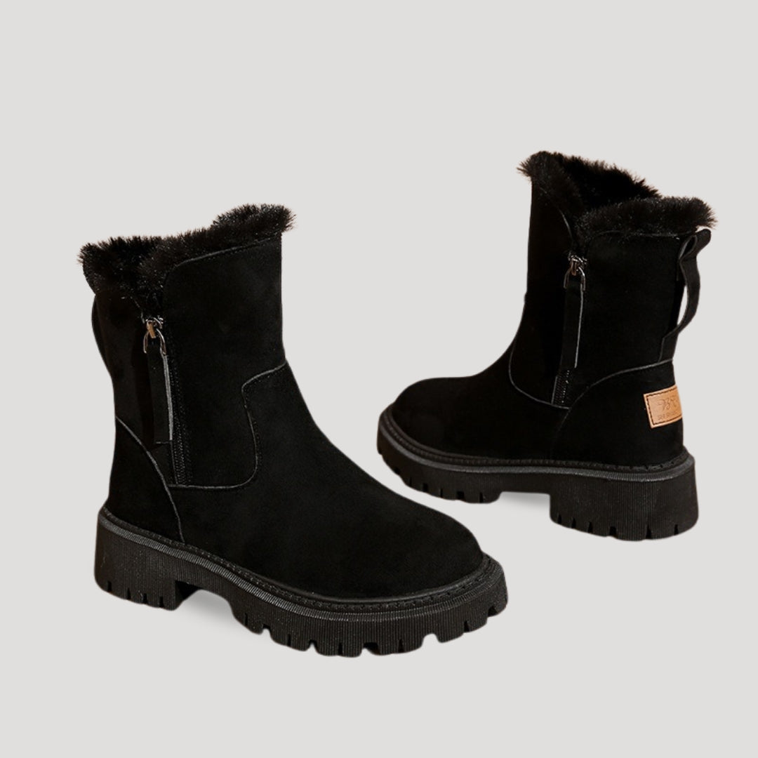 Vinterankle boots i svart med fodrad insida för kallt väder. 4
